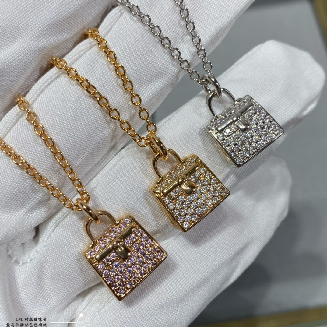 H**me5 fully di*m*nd-encrusted bag necklace