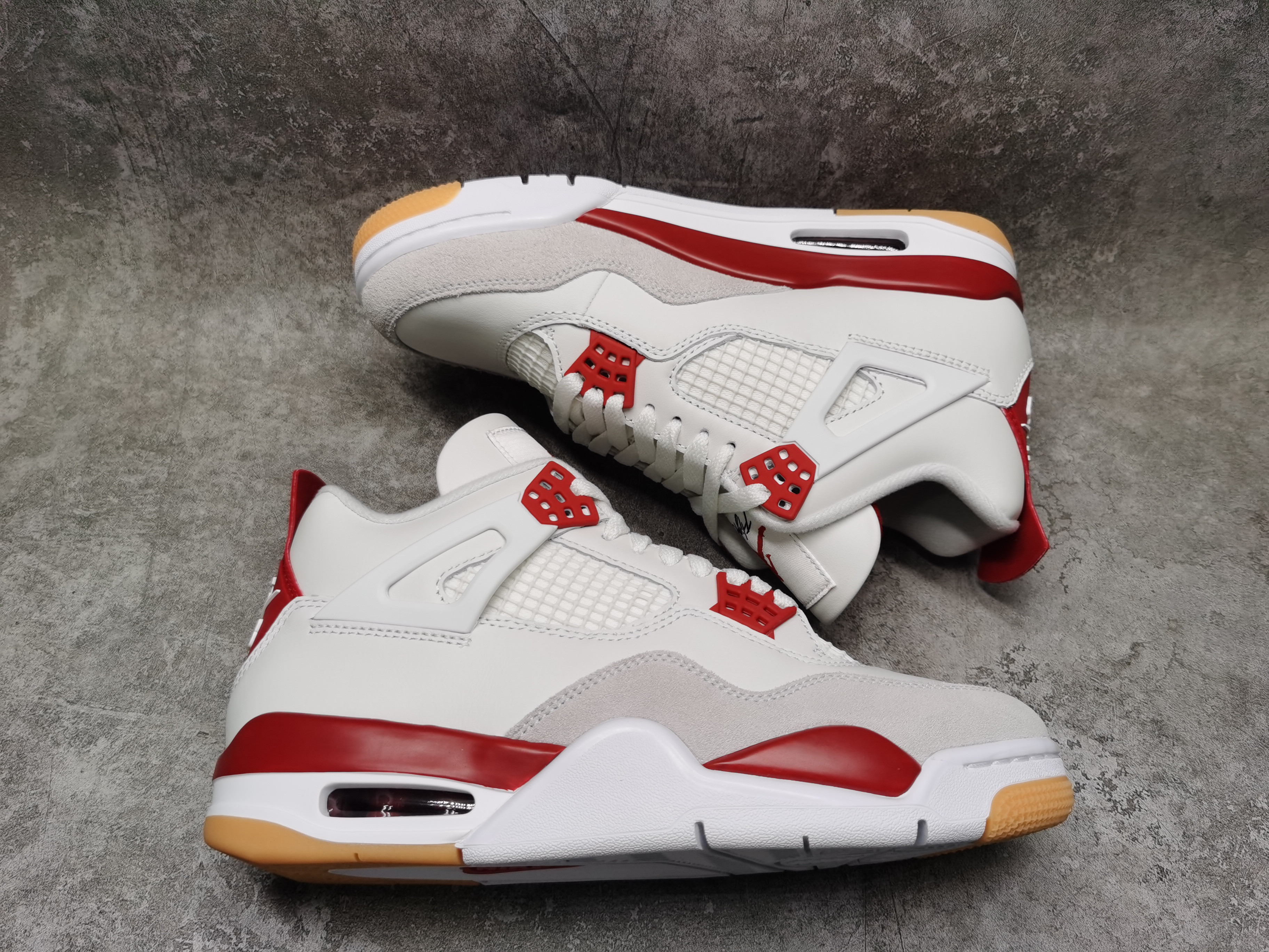 UA Jordan 4 Retro SB