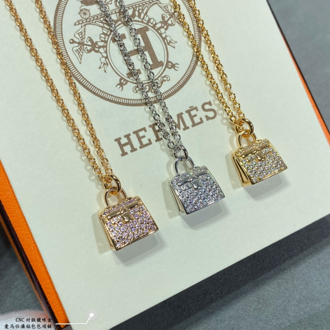 H**me5 fully di*m*nd-encrusted bag necklace