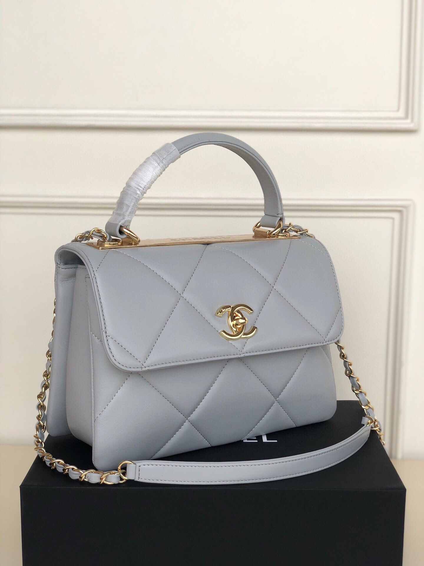 Ch*el flap bag with top handle 6.6 × 9.8 × 4.7 in