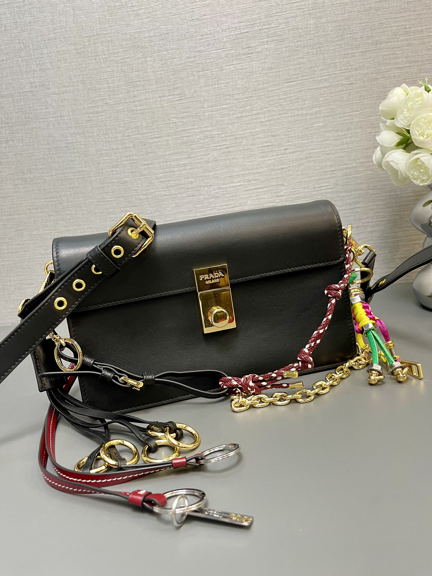 Pra*a soft sound small leather shoulder bag with charm 13.5x24x6cm