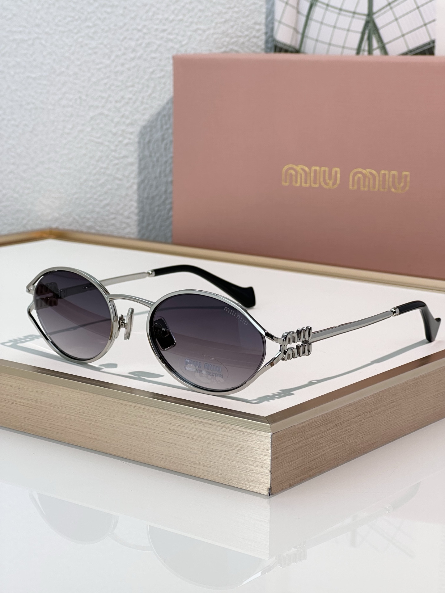 Miu Miu Glasses SMU52Y 54-21-125